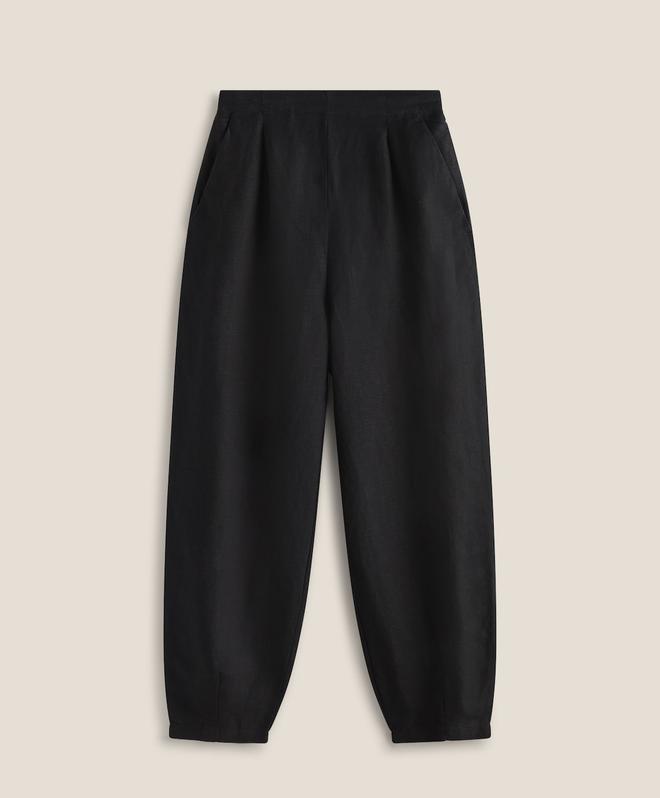 Pantalones slouchy de color negro, de Oysho