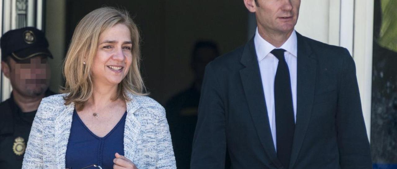 Cristina de Borbón e Iñaki Urdangarin, en los días del juicio.