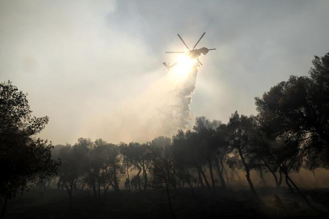 Wildfire spreads in Greeces Attica region