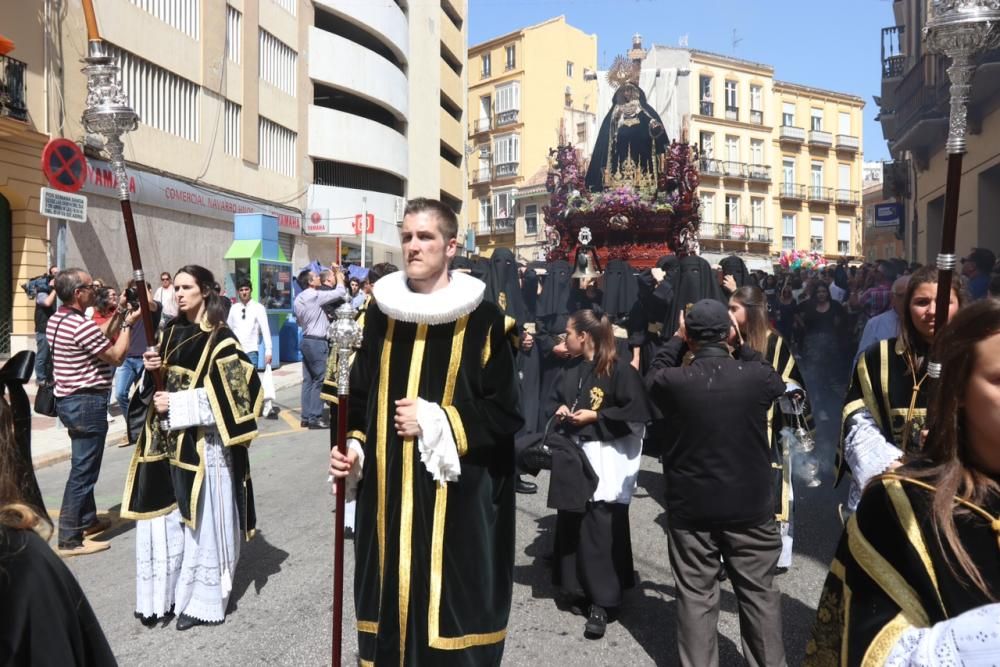 La Virgen de los Dolores en su Amparo y Misericordia, iniciando su recorrido por las calles de Málaga