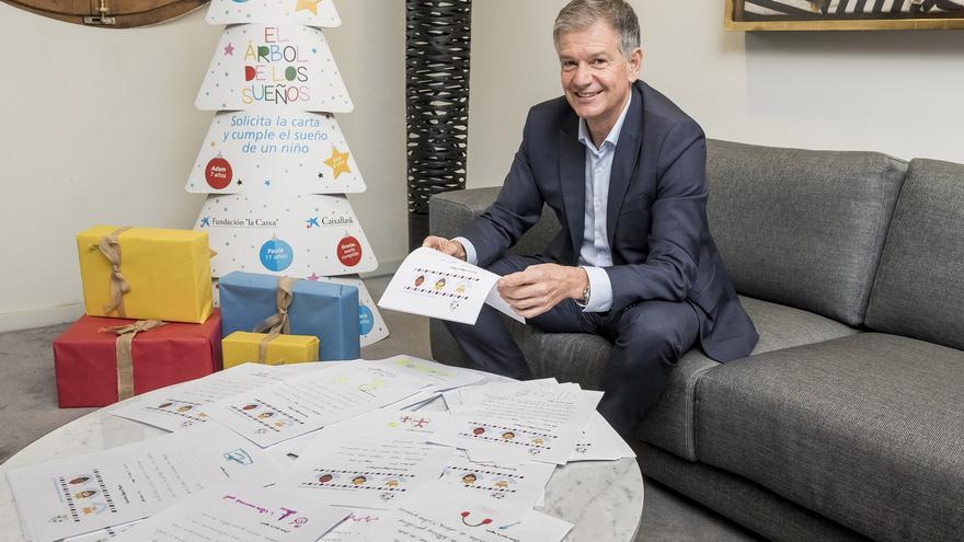 Empleados y clientes de CaixaBank entregarán regalos  de Navidad a 2.700 niños de la  Comunidad en situación de pobreza