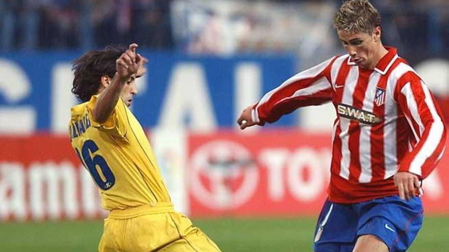 Torres, en un partido con el Atlético de Madrid.