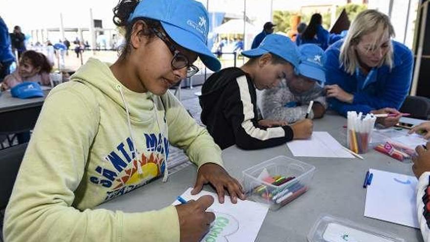 Acto de La Caixa con menores de edad.