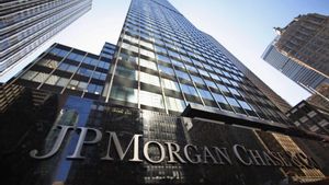 A sign outside the headquarters of JP Morgan Chase & Co in New York, in this September 19, 2013 file photo. JPMorgan Chase & Co on October 11, 2013 posted its first quarterly loss under Chairman and CEO Jamie Dimon after a tangle of legal and regulatory probes cost the biggest U.S. bank $7.2 billion.  REUTERS/Mike Segar/Files   (UNITED STATES - Tags: BUSINESS LOGO CRIME LAW)