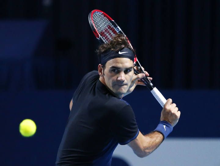 Switzerland's Federer returns a ball to Nadal of Spain during their match at the Swiss Indoors ATP men's tennis tournament in Basel