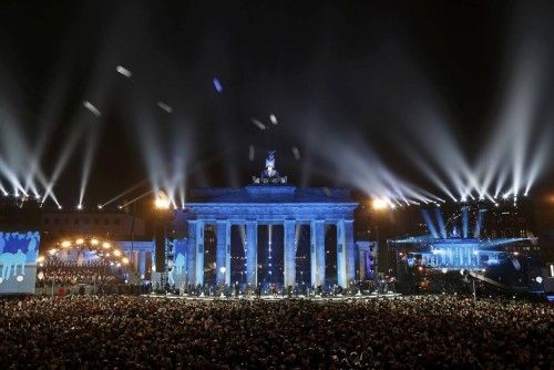Balloons which were part of the installation 'Lichtgrenze' (Border of Light) are released in front of the Brandenburg Gate in Berlin