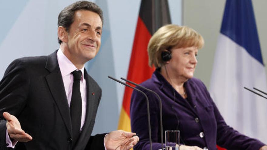 Merkel y Sarkozy.