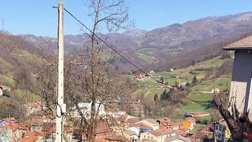 El acceso al barrio del Cantu, en Villoria.