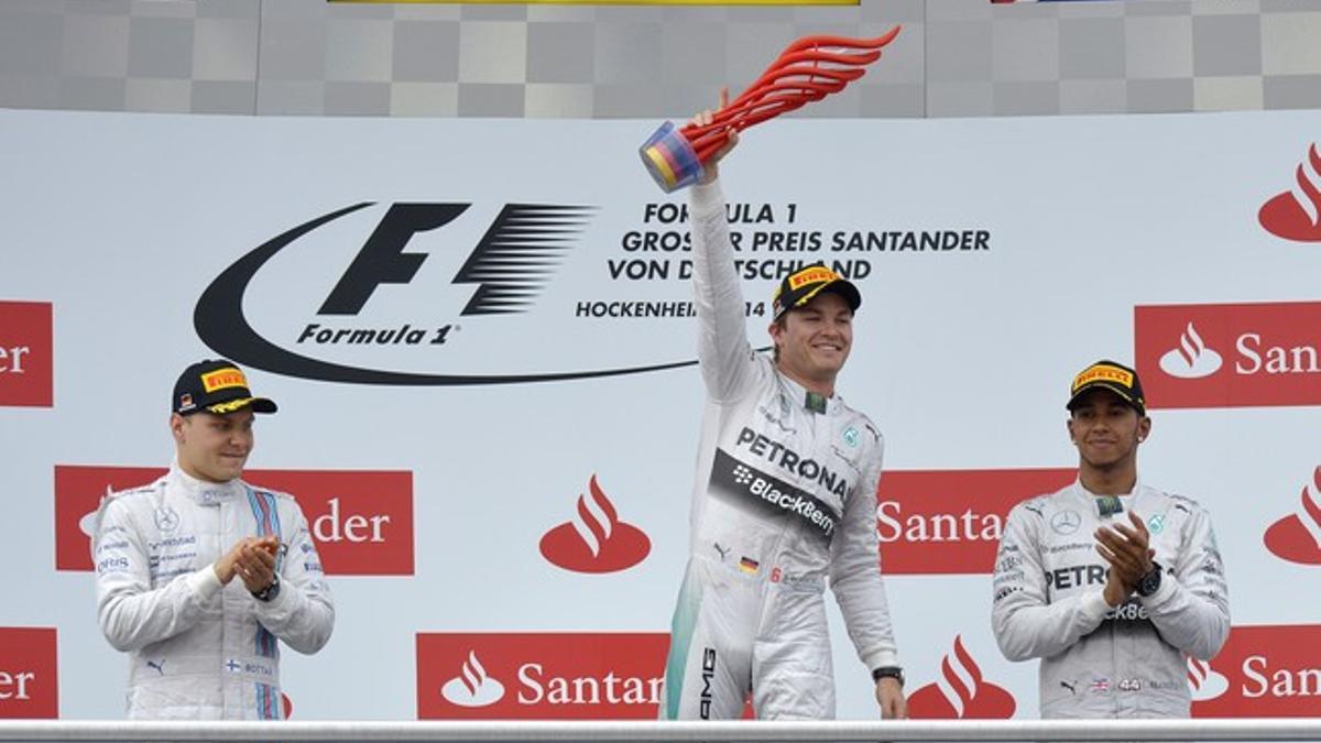 Nico Rosberg, en el centro, con Valtteri Bottas y Lewis Hamilton, en el podio de Hockenheim.