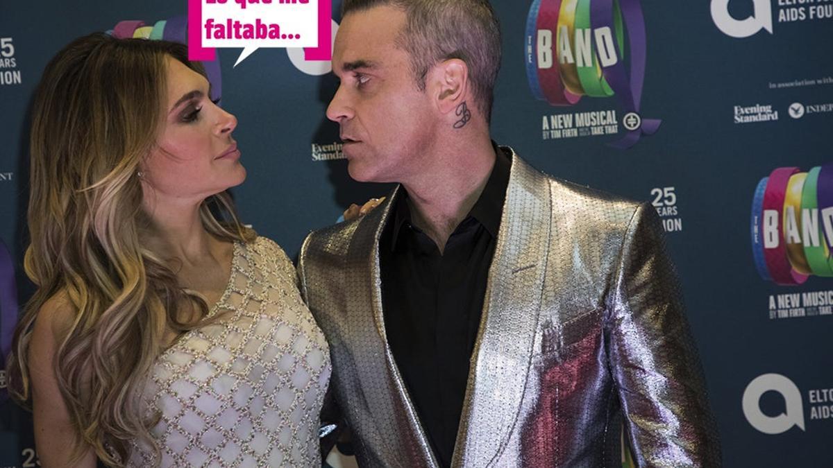 Robbie Williams y Ayda Field mirándose