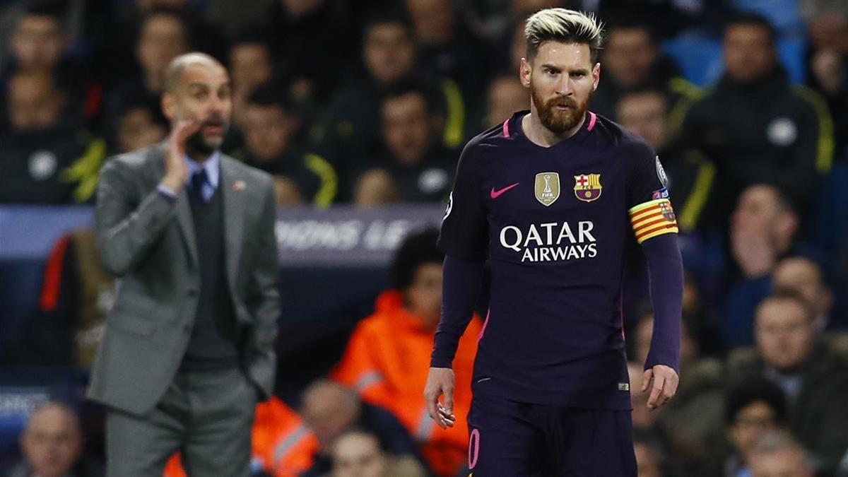 Guardiola, entrenador del City, y Messi, en un duelo de la Champions.