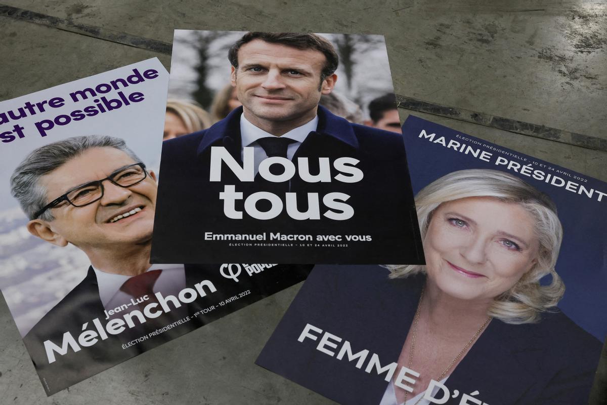 Posters de campaña electoral de Emmanuel Macron, Marine Le Pen y Jean-Luc Mélenchon.