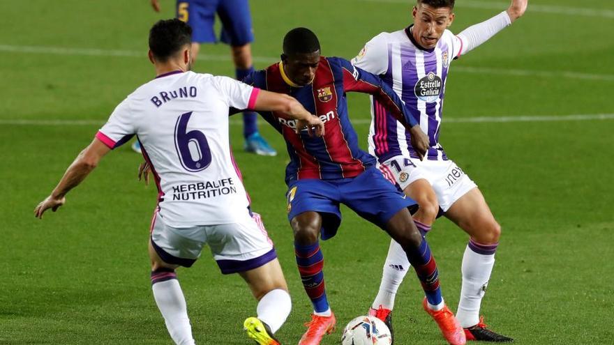 El Barcelona vence &#039;in extremis&#039; al Valladolid y se pone a un punto del líder