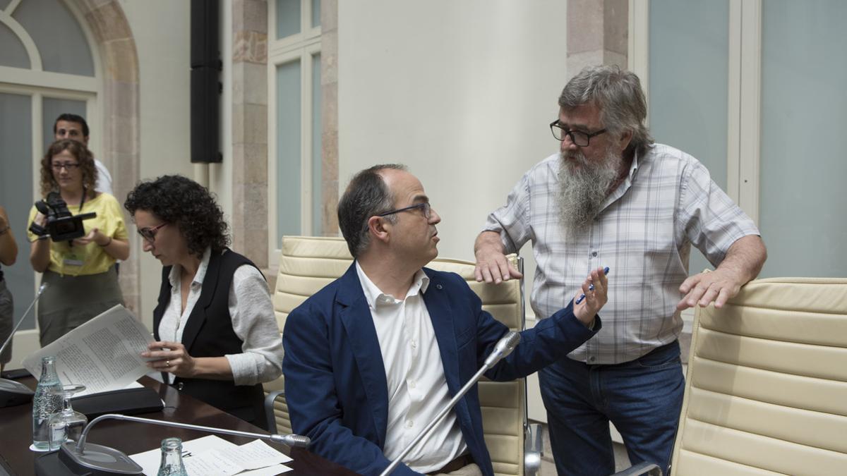 Marta Rovira (ERC), Jordi Turull (Pdecat) y Joan Garriga (CUP), el 4 de julio del 2017 en el auditorio del Parlament.