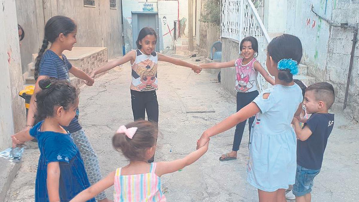 Niñas palestinas jugando.