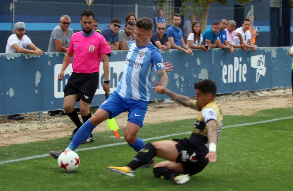 El filial malaguista empata a cero con el conjunto murciano en la ida y se jugará el ascenso en la vuelta.