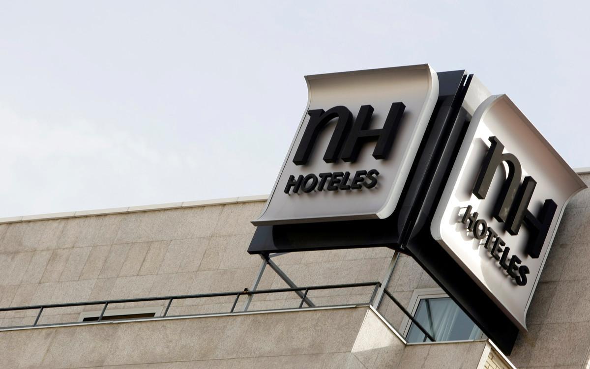 FILE PHOTO: The logo of Spanish NH Hoteles chain is seen on the roof of one of its hotel in central Madrid October 28, 2009. REUTERS/Sergio Perez/File Photo FILE PHOTO: The logo of Spanish NH Hoteles chain is seen on the roof of one of its hotel in central Madrid October 28, 2009. REUTERS/Sergio Perez/File Photo