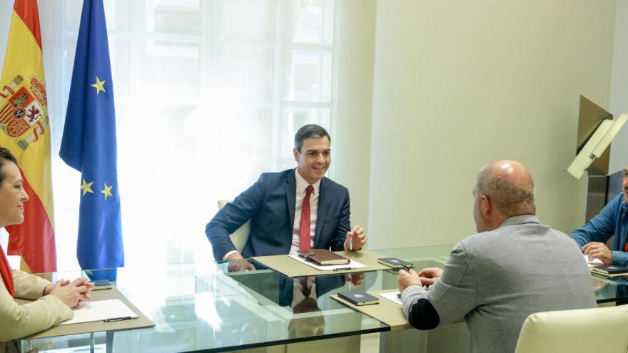 Magdalena Valerio, Pedro Sánchez, Unai Sordo i José Álvarez, durant la reunió a La Moncloa