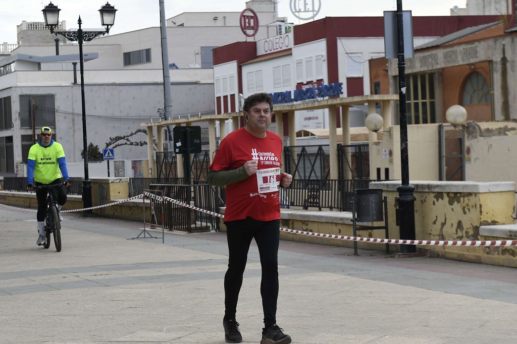 La XIII carrera solidaria Corriendo con Assido, en imágenes