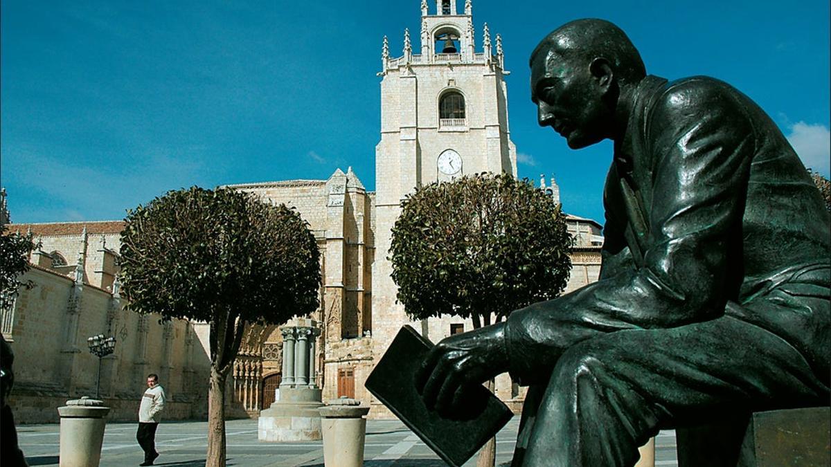 Monumento al
maestro, esculpido por Rafael Cordero, con la
Catedral de Palencia al fondo