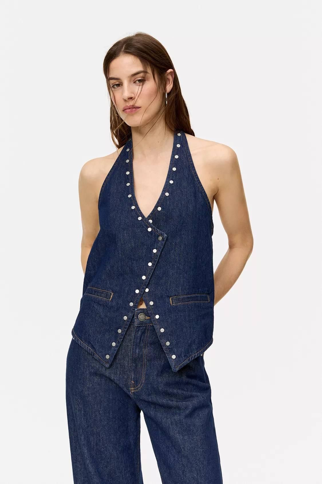 Chaleco vaquero cruzado tachas