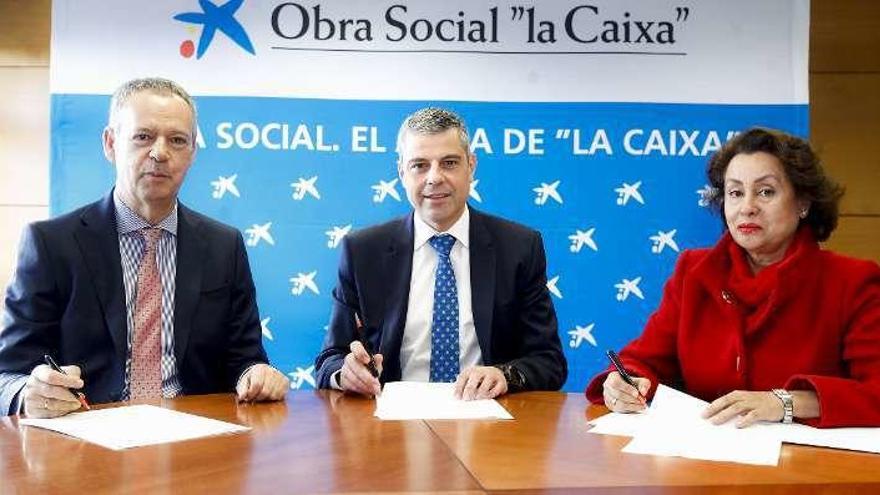 Firma del acuerdo entre La Caixa y Gas Natural Fenosa.