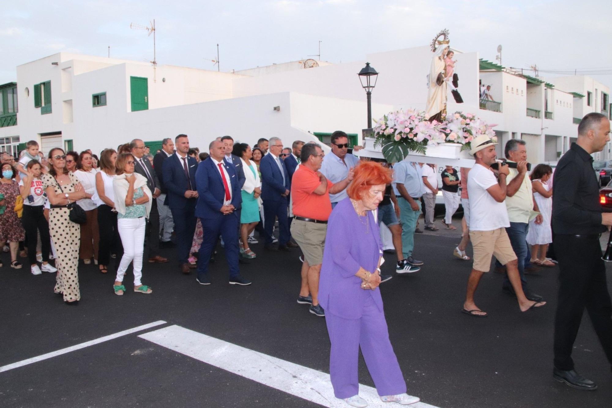 Procesión marítima y terrestre de la Virgen del Carmen en Playa Blanca