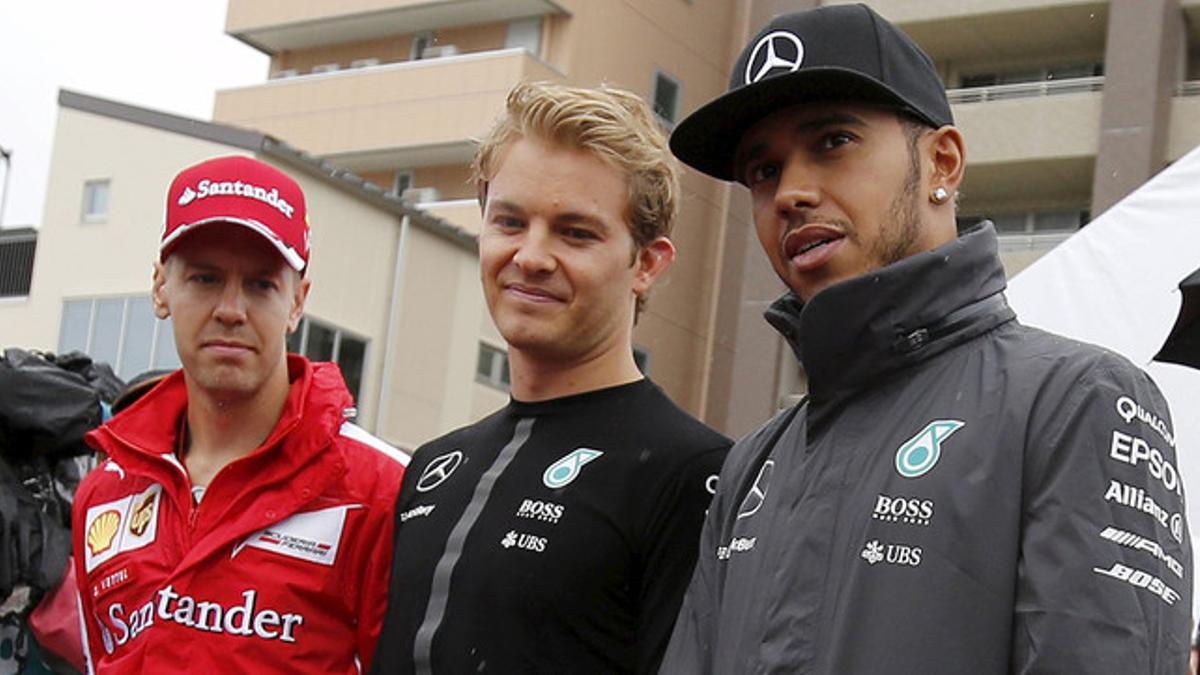 Los pilotos Sebastian Vettel (Ferrari), Lewis Hamilton (Mercedes) y Nico Rosberg (Mercedes), en el circuito de Suzuka