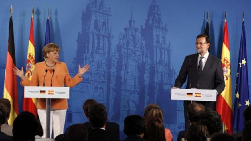 Rajoy y Merkel defienden continuar con las reformas