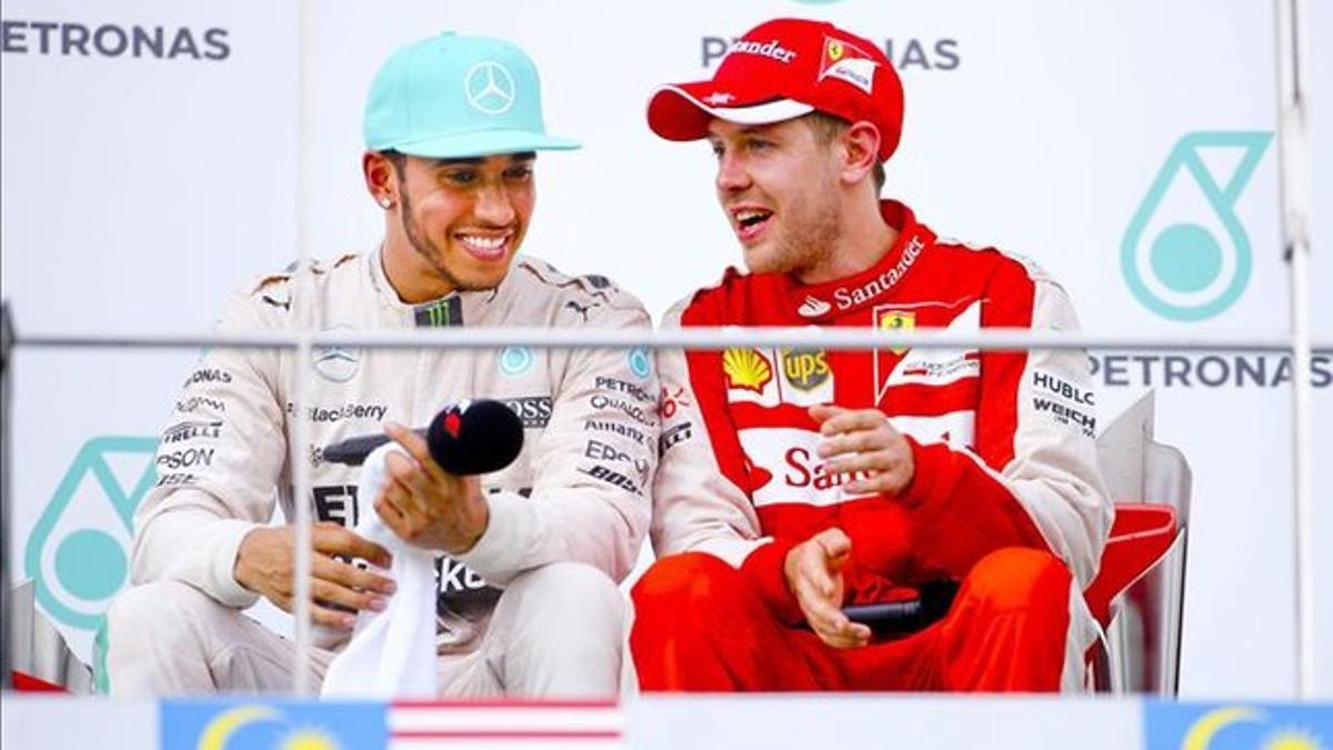 Hamilton y Vettel, en el podio de Malasia este domingo