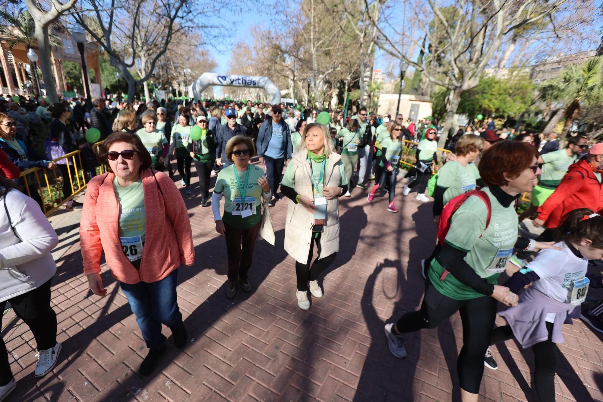 Búscate en la galería: Castelló se viste de verde en la IX marcha contra el cáncer