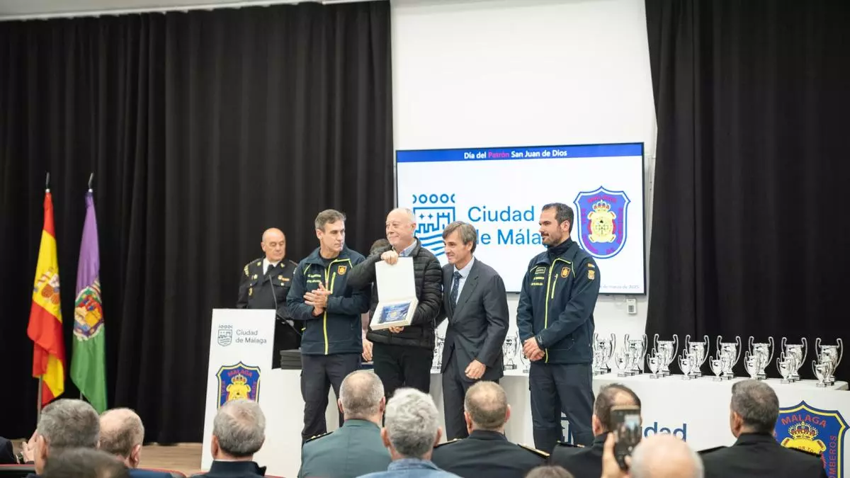 Los bomberos de Málaga celebran el día de su patrón, San Juan de Dios