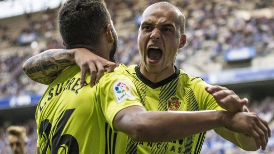 Pombo y Luis Suárez, durante un encuentro.