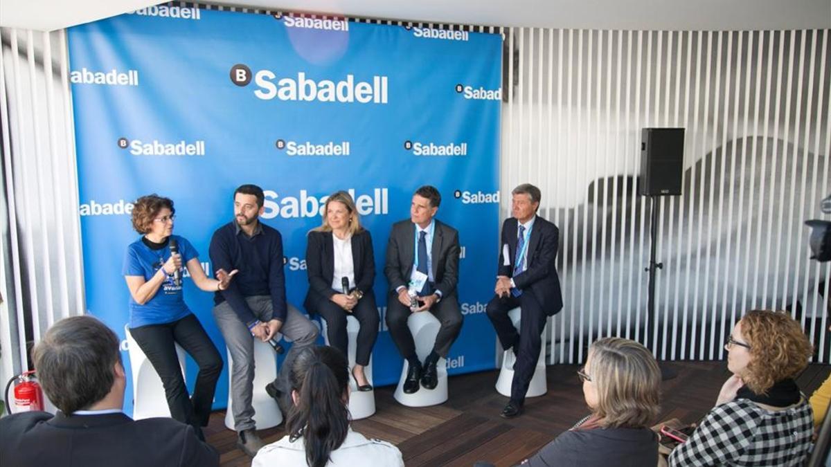 Presentación de la iniciativa solidaria, en el Village del Open Banco Sabadell