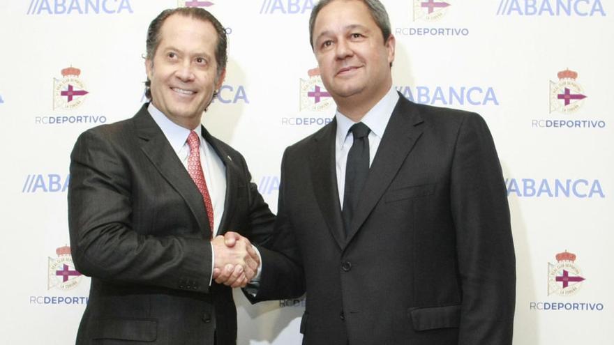 Escotet y Tino Fernández sellan el acuerdo // EFE