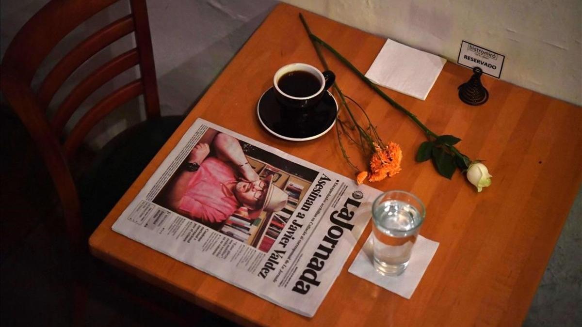 zentauroepp38463867 a makeshift altar with a cup of coffee and water glass is pi170525130001