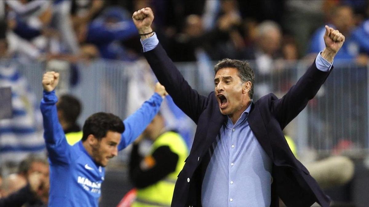 Michel celebra un gol del Málaga en el partido contra el Sevilla.