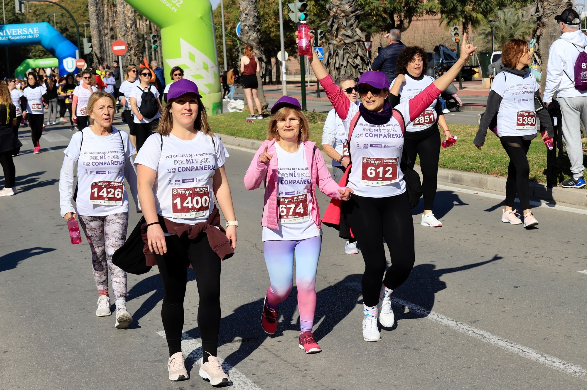 La salida y el recorrido de la Carrera de la Mujer 'inmortalizados' en imágenes