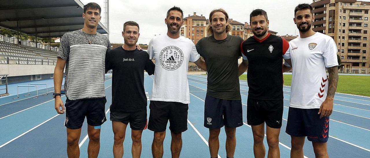 Pablo Pérez, Cayarga, Jaime Fernández, Mendiguchía, Canella y Álex García, en la pista del estadio de atletismo Yago Lamela.