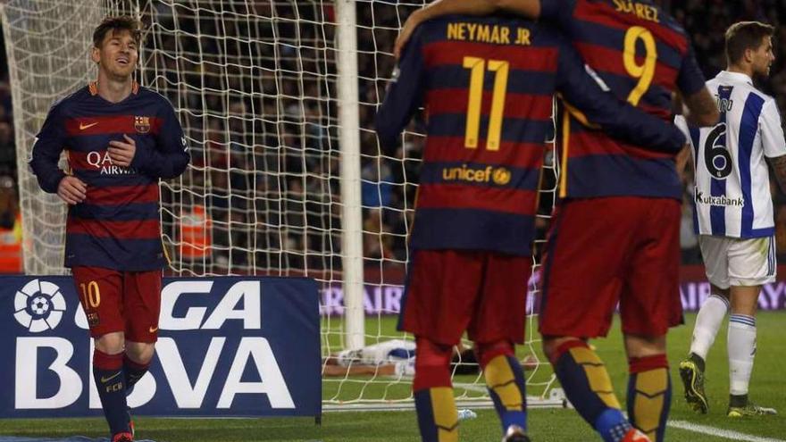 Messi, a la izquierda, en plena celebración junto a Neymar y Luis Suárez.