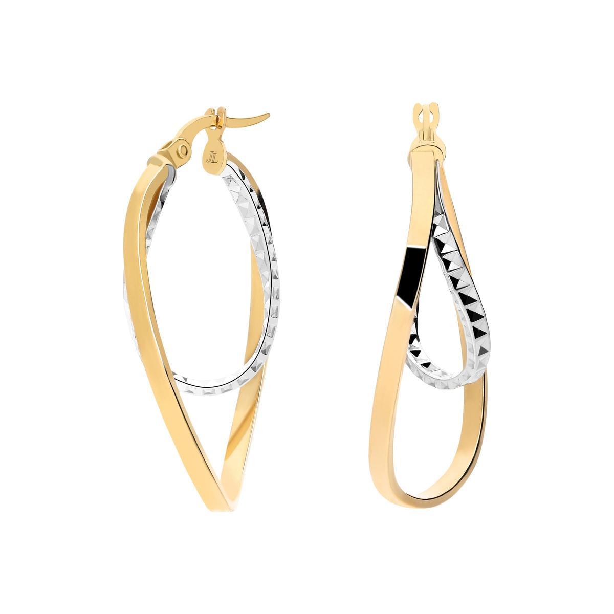 Pendientes de oro bicolor de 18 quilates. (489€)