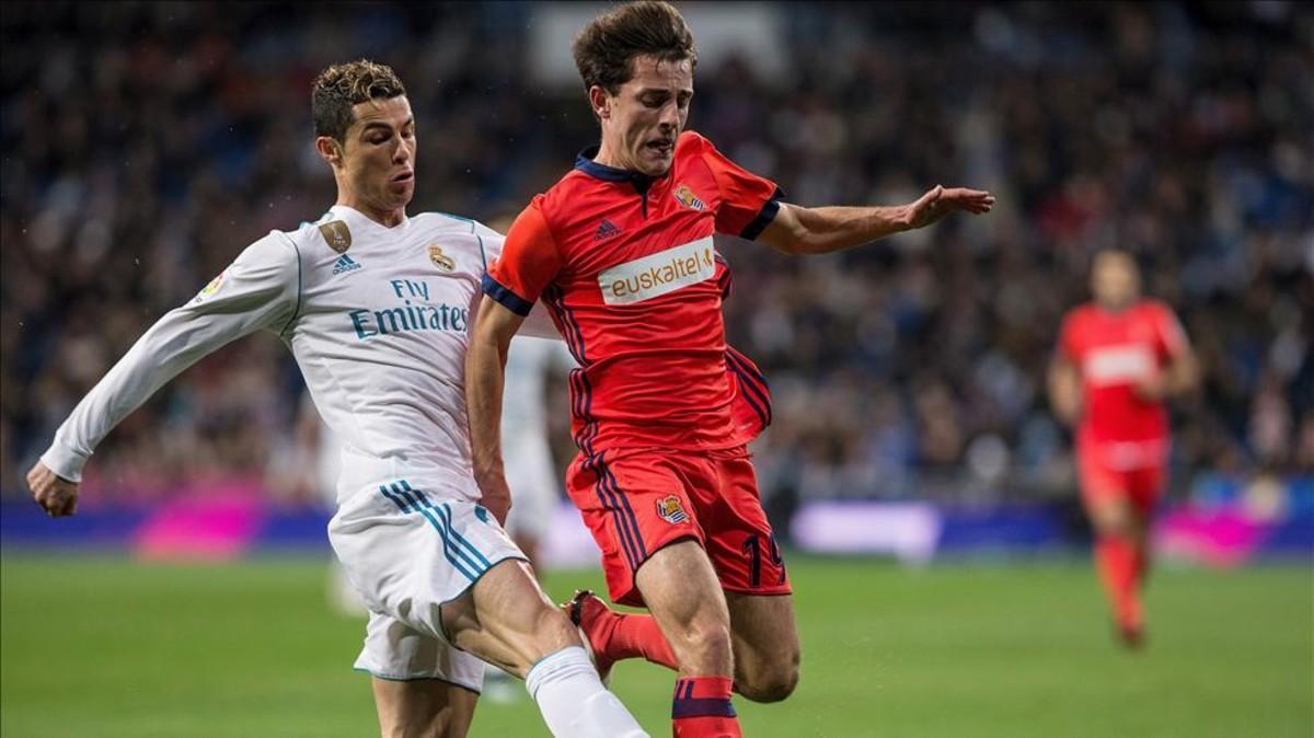 Odriozola, en un partido de la Real Sociedad con Cristiano Ronaldo