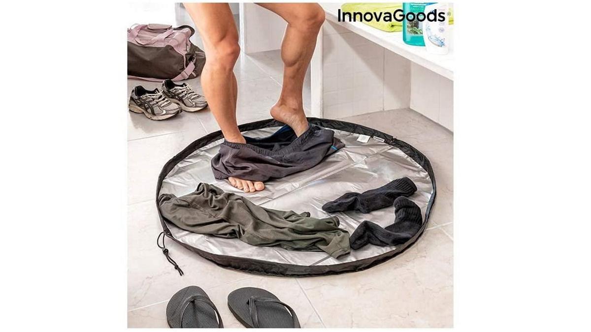 InnovaGoods esterilla para vestuarios y bolsa impermeable.