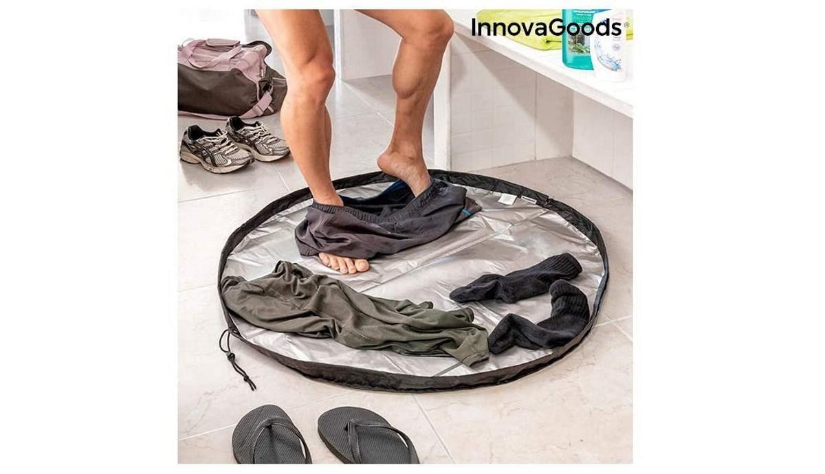 InnovaGoods esterilla para vestuarios y bolsa impermeable.
