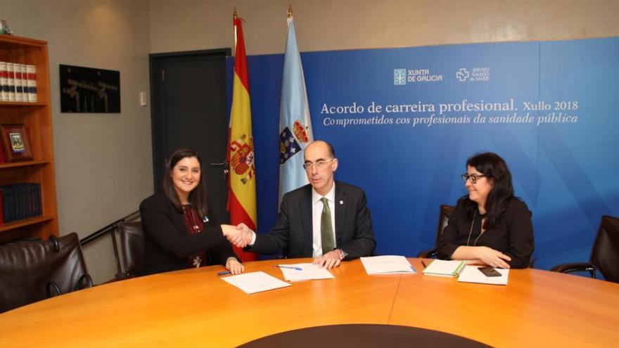 Santos y Almuiña en la reunión de esta mañana.