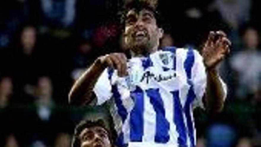 Vital éxito del Málaga y golazo de Romero