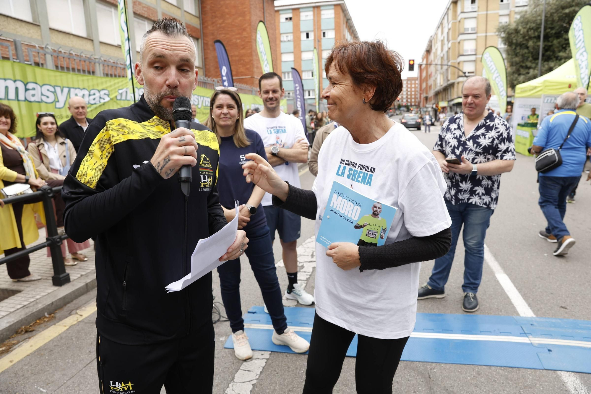 La carrera popular solidaria en El Llano, en Gijón, en imágenes