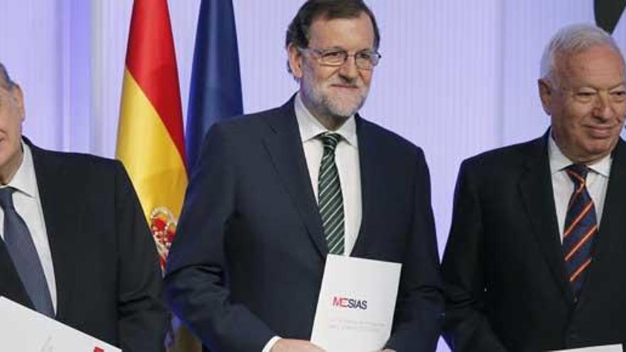 Rajoy, con Fernández Díaz y Margallo.