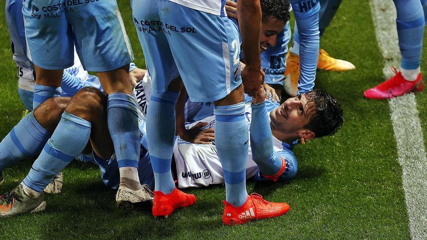 El conjunto blanquiazul celebra el gol de Chavarría.