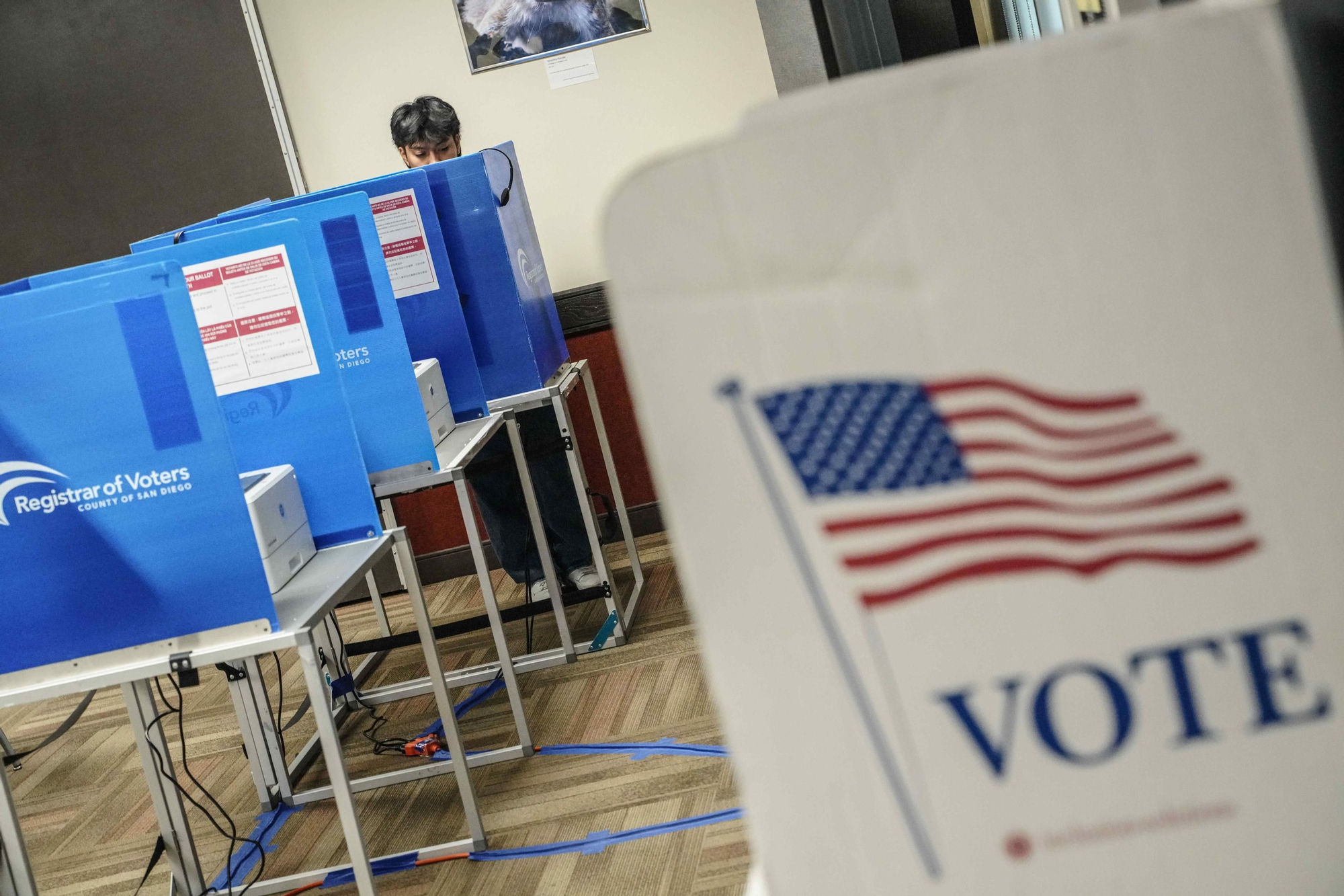 November 2, 2024, San Diego, California, United States: A student votes at one of the voting centers on campus. In San Diego County, all vote centers for the 2024 presidential election open on Saturday, November 2nd, and remain open until 8 PM on Election
